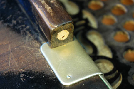 Neue Riemenbefestigung mit Füllung